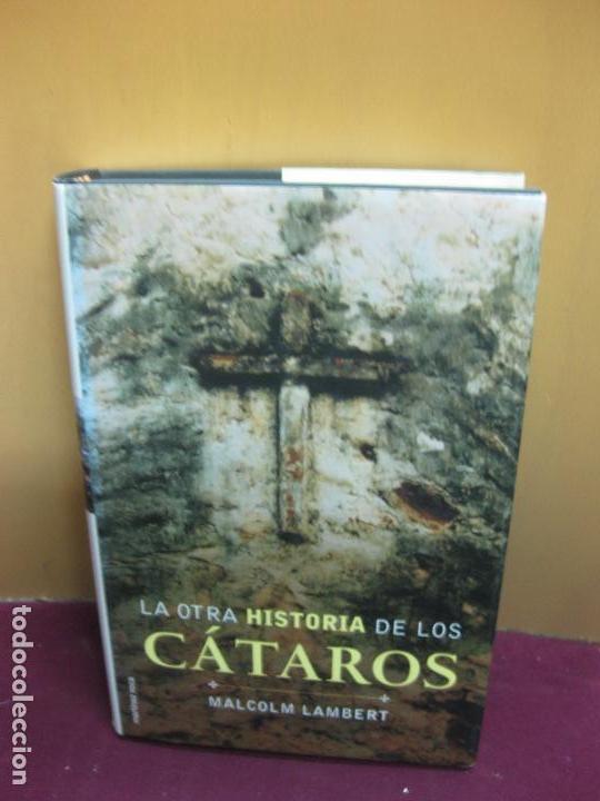 Libros de segunda mano: LA OTRA HISTORIA DE LOS CATAROS. MALCOM LAMBERT.MARTINEZ ROCA 1&ordf; EDICION 2001. - Foto 1