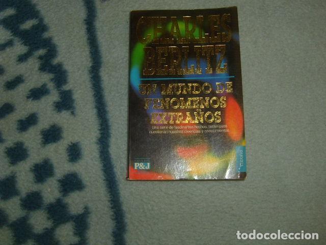 Libros de segunda mano: UN MUNDO DE FENOMENOS EXTRA&Ntilde;OS , CHARLES BERLITZ - Foto 1