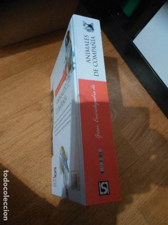 Libros de segunda mano: Gran enciclopedia Animales de compa&ntilde;&iacute;a. Servilibro. - Foto 2