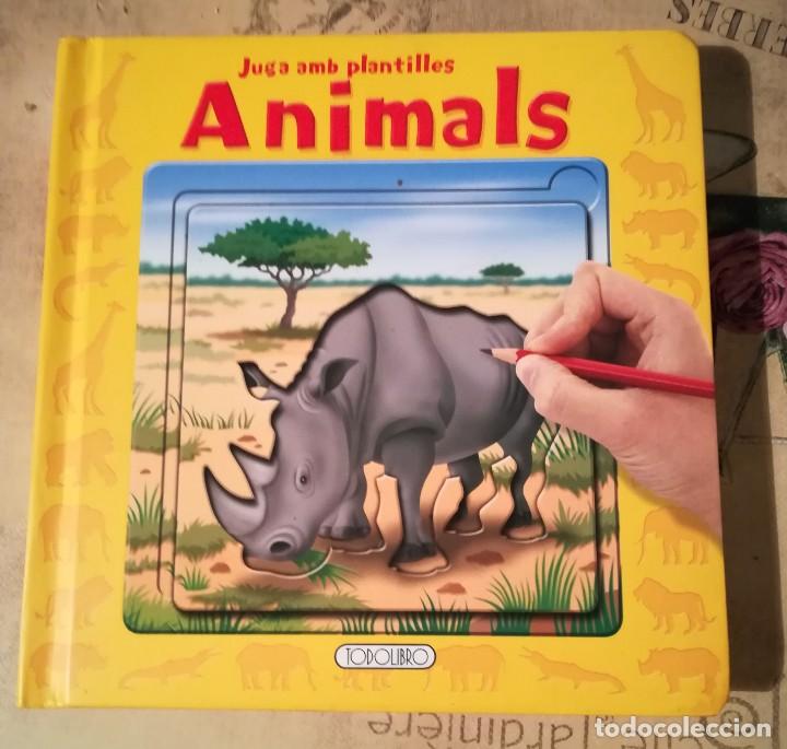 Libros de segunda mano: Juga amb plantilles. Animals - en catal&agrave; - Foto 1