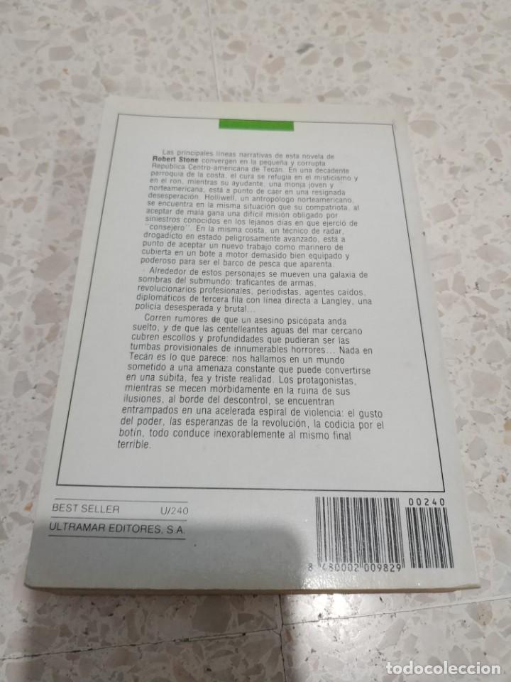 Libros de segunda mano: BANDERAS AL AMANECER.- ROBERT STONE - Foto 3