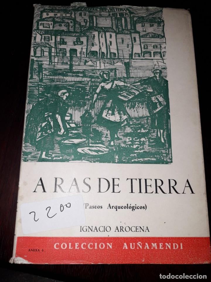 Libros de segunda mano: LIBRO 2200 A RAS DE TIERRA IGNACIO AROCENA PASEOS ARQUEOLOGICOS COLECCION AU&Ntilde;AMENDI SAN SEBASTIAN