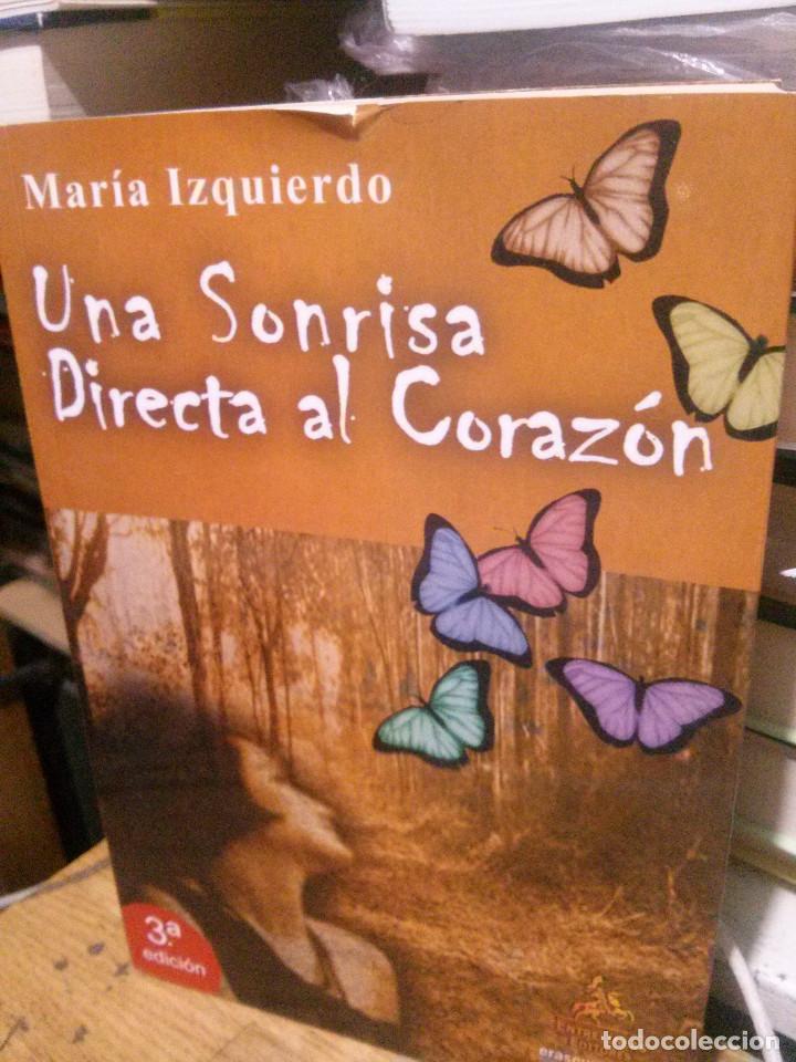 Libros de segunda mano: UNA SONRISA DIRECTA AL CORAZON, MARIA IZQUIERDO, ED. ENTRELINEAS - Foto 1