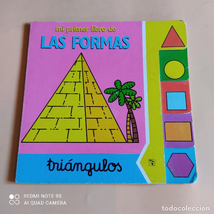 Libros de segunda mano: MI PRIMER LIBRO DE LAS FORMAS. TRIANGULOS. 2004. EDICIONES SALAMANDRA. - Foto 1