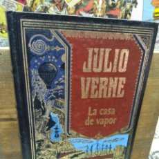 Libros de segunda mano: JULIO VERNE. RBA. LA CASA DE VAPOR.. Lote 267364404
