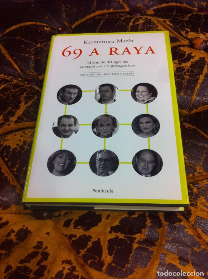 Libri di seconda mano: KARMENTXU MAR&Iacute;N. 69 A RAYA. EL MUNDO DEL SIGLO XXI CONTADO POR SUS PROTAGONISTAS. 2005