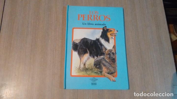 Libros de segunda mano: LOS PERROS - UN LIBRO ANIMADO - - Foto 1