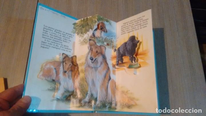 Libros de segunda mano: LOS PERROS - UN LIBRO ANIMADO - - Foto 2