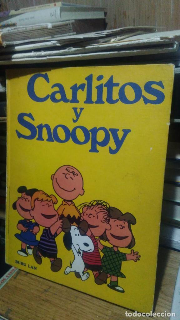 Libros de segunda mano: CARLITOS Y SNOOPY, BURU LAN,SCHULZ