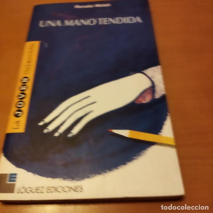 Libros de segunda mano: Una mano tendida - Foto 1