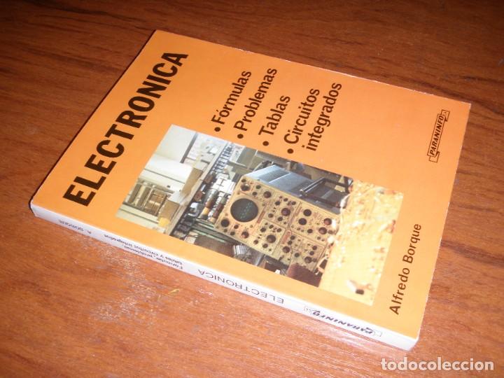 Libros de segunda mano: ELECTRONICA FORMULAS PROBLEMAS TABLAS CIRCUITOS INTEGRADOS PARANINFO - Foto 2