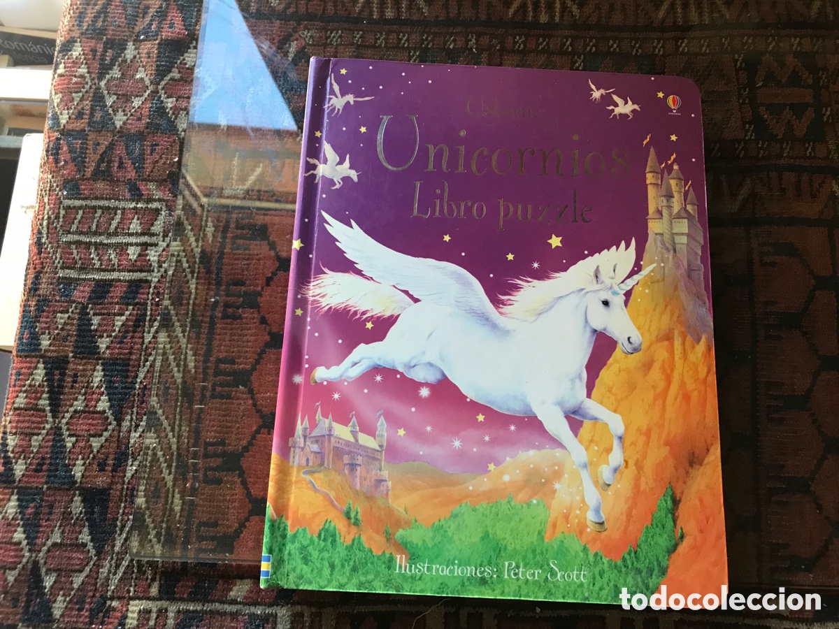Libros de segunda mano: Unicornios. Libro puzzle. Usborne. Ilustraciones Peter Scott. - Foto 1
