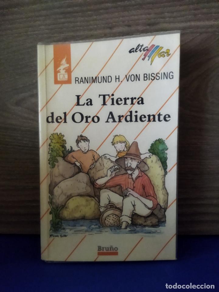 Libros de segunda mano: la tierra del oro ardiente - Foto 1