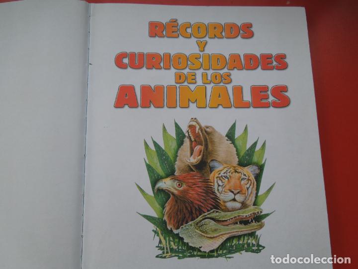 Libros de segunda mano: RECORDS Y CURISIODADES DE LOS ANIMALES - SERVILIBRO - 2003 - ACOLCHADO - Foto 3