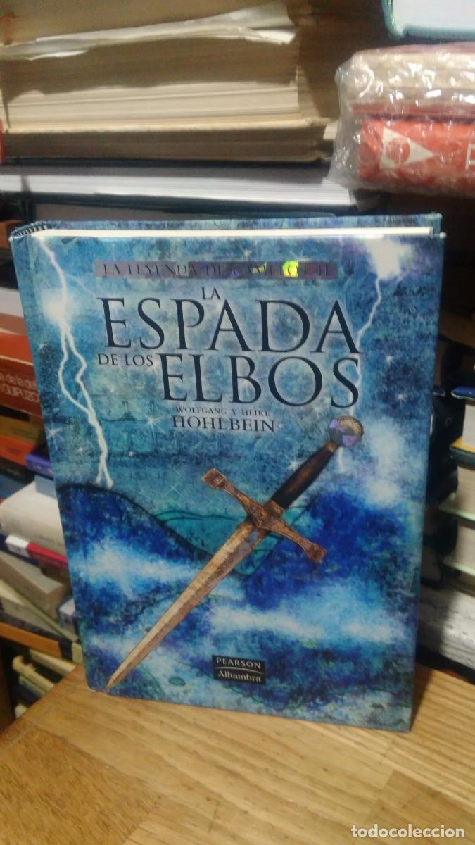 Libros de segunda mano: LA ESPADA DE LOS ELBOS, WOLFGANG Y HEIKE HOHLBEIN, ED. PEARSON - Foto 1