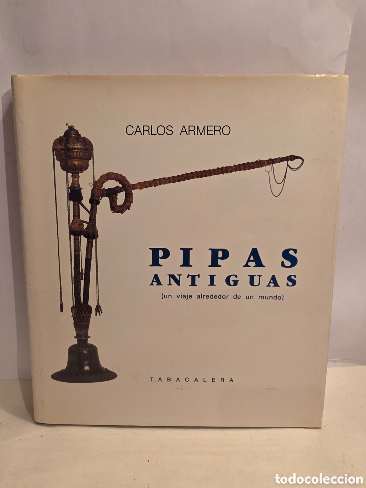 Libros de segunda mano: PIPAS ANTIGUAS. CARLOS ARMERO. TABACALERA 1989. UN VIAJE ALREDEDOR DE UN MUNDO.