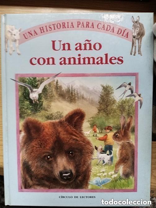 Libros de segunda mano: UN A&Ntilde;O CON ANIMALES - UNA HISTORIA PARA CADA DIA -libro grande tapas duras