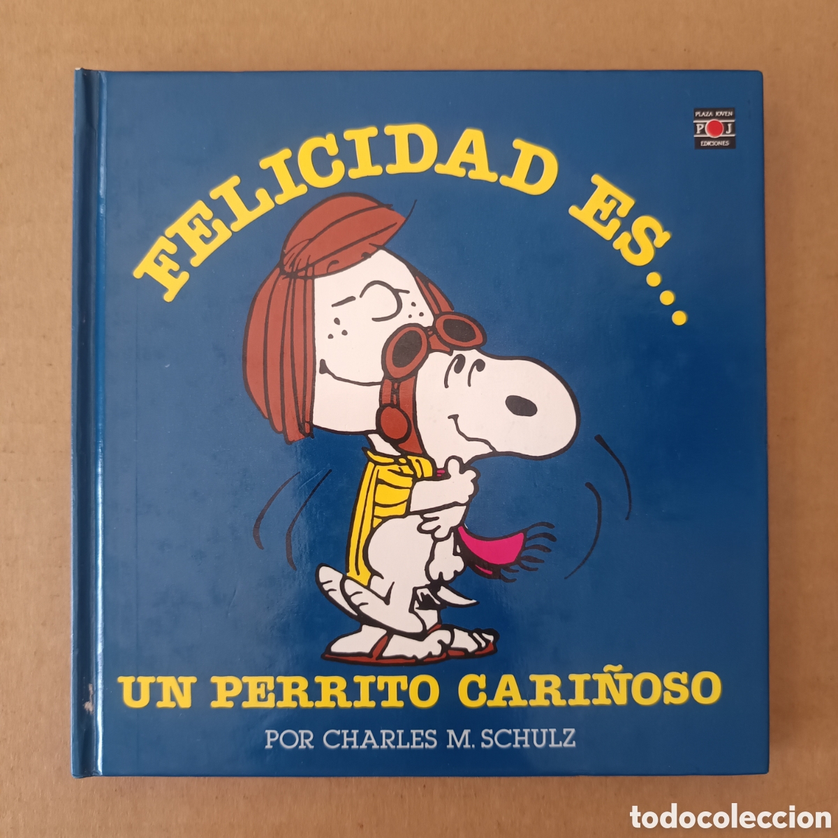 Libros de segunda mano: Felicidad es... un Perrito Cari&ntilde;oso, por Charles M. Schulz (Plaza Joven, 1989).