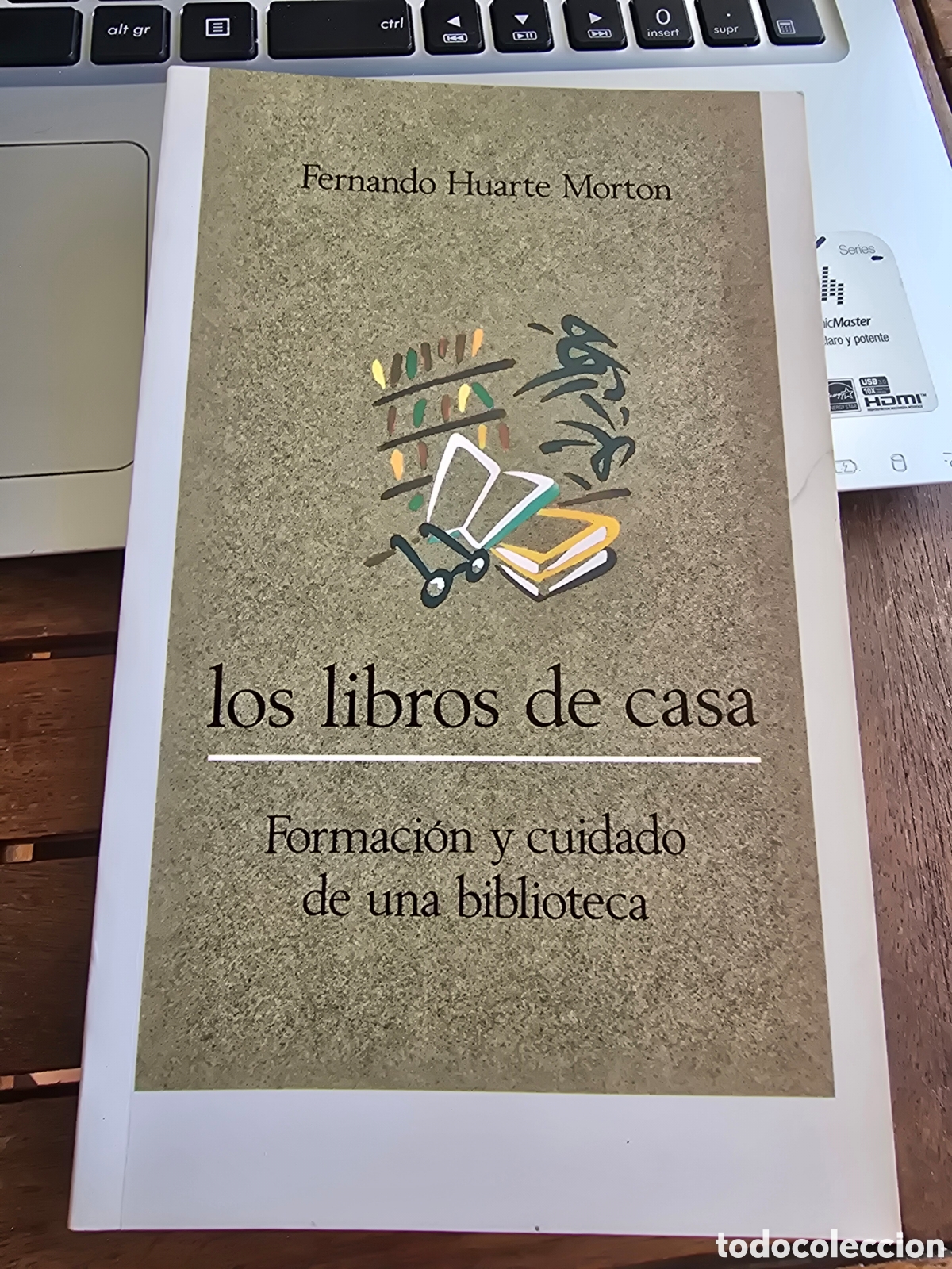 Libros de segunda mano: LOS LIBROS DE CASA Formacion y cuidado de una biblioteca FERNANDO HUARTE MORTON CEGAL 1985