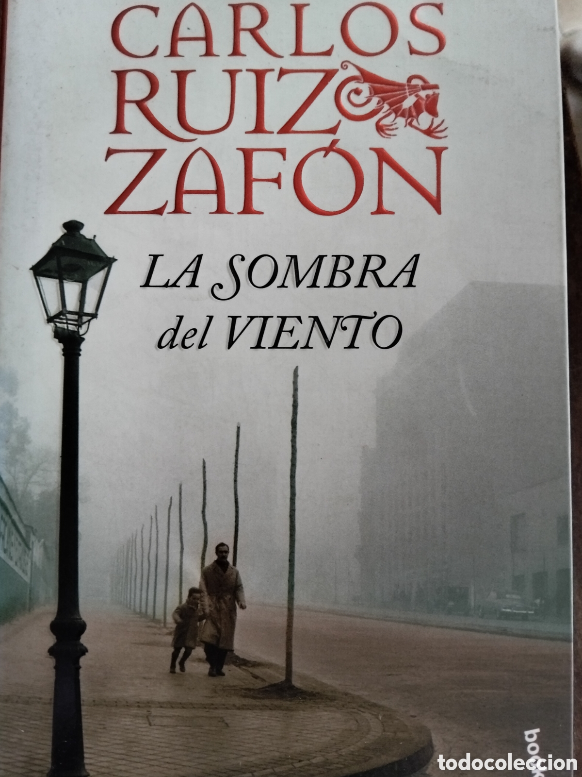 Libros de segunda mano: LA SOMBRA DEL VIENTO CARLOS RUIZ ZAFON
