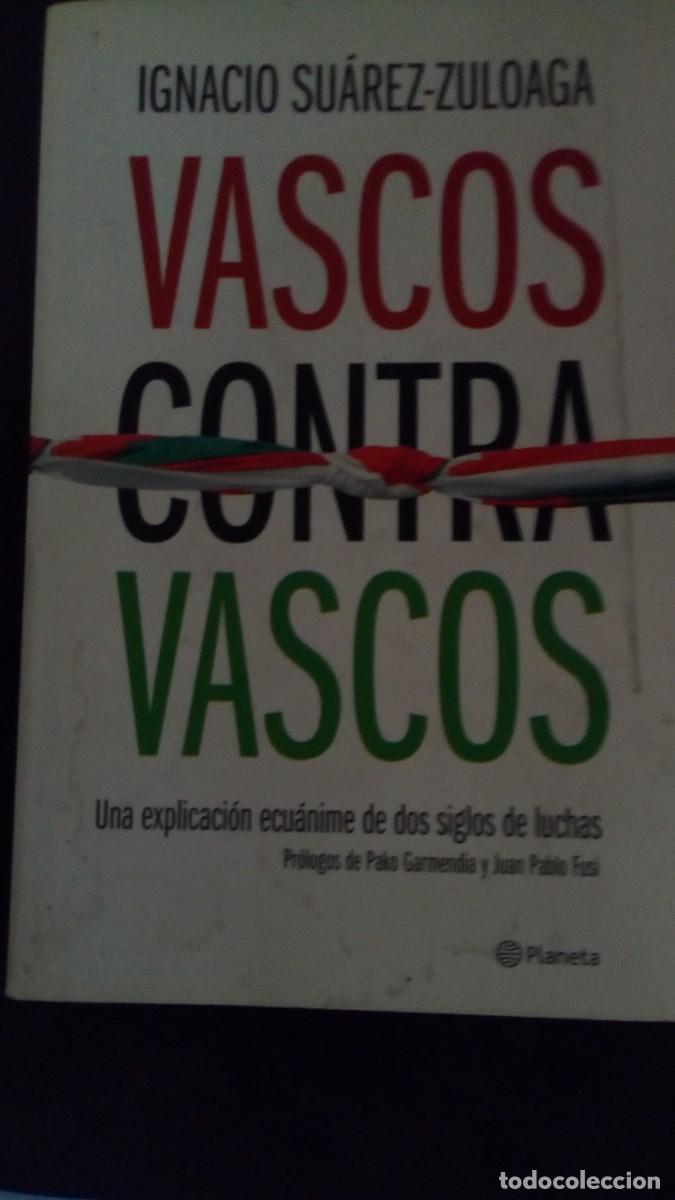 Libros de segunda mano: VASCOS CONTRA VASCOS. UNA EXPLICACION DE DOS SIGLOS DE LUCHAS. IGNACIO SUAREZ ZULOAGA-COMO NUEVO