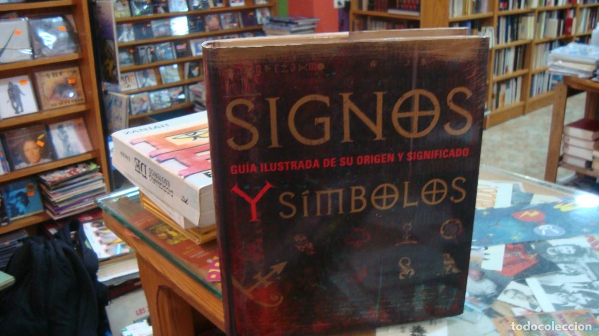 Libros de segunda mano: Signos y s&iacute;mbolos. Gu&iacute;a ilustrada