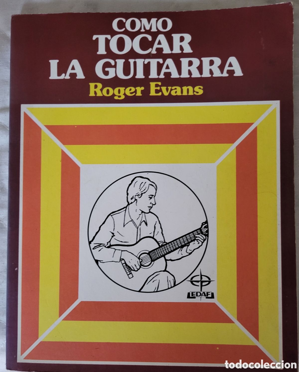 Libros de segunda mano: Como tocar la guitarra/Roger Evans