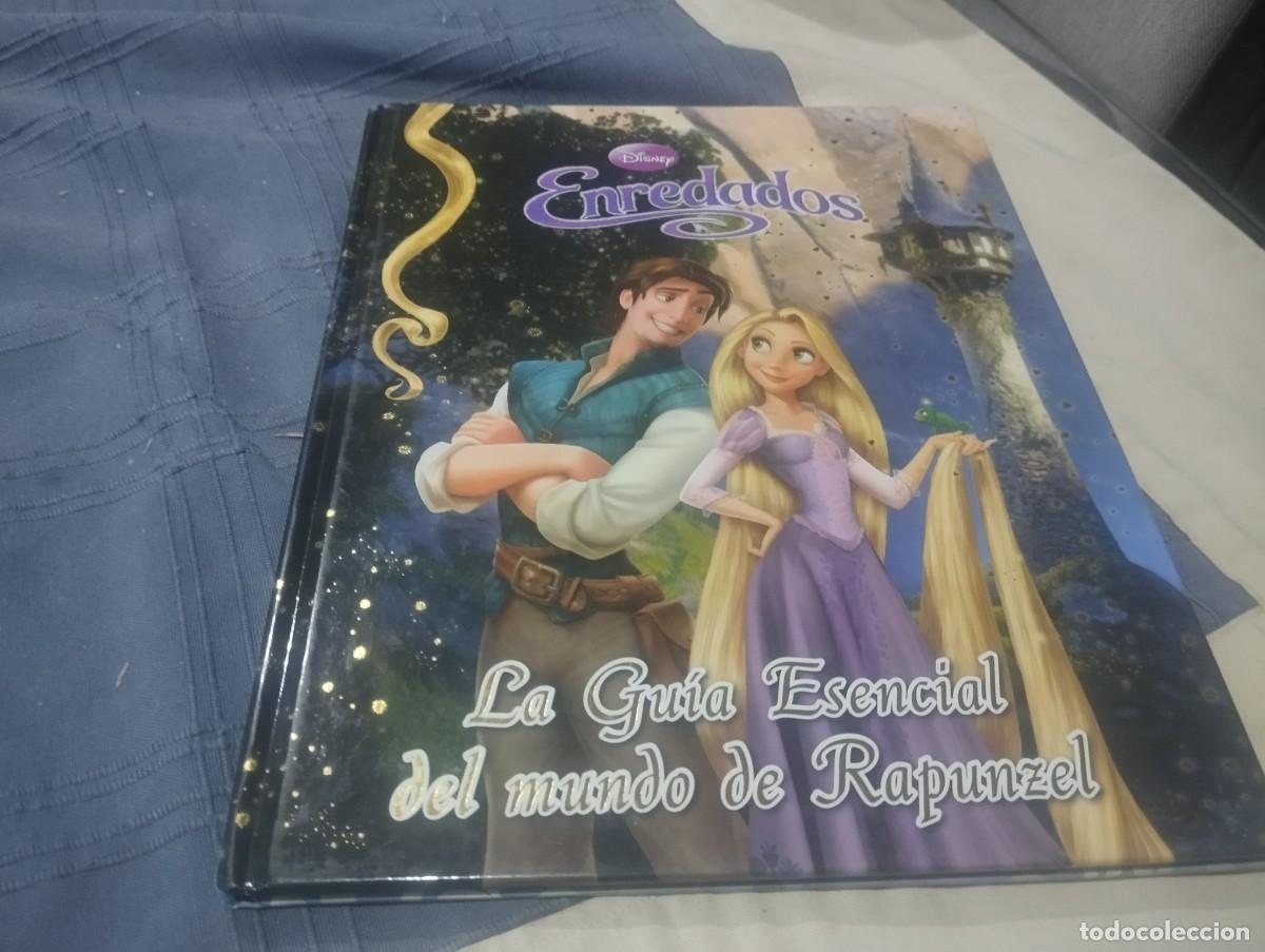 Libros de segunda mano: ENREDADOS LA GUIA ESENCIAL DEL MUNDO DE RAPUNZEL / DISNEY 2011