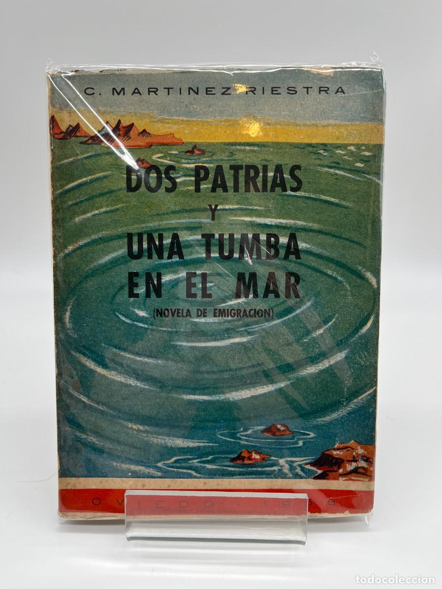 Libros de segunda mano: DOS PATRIAS Y UNA TUMBA EN EL MAR de C. Martinez Riestra (Oviedo 1958)
