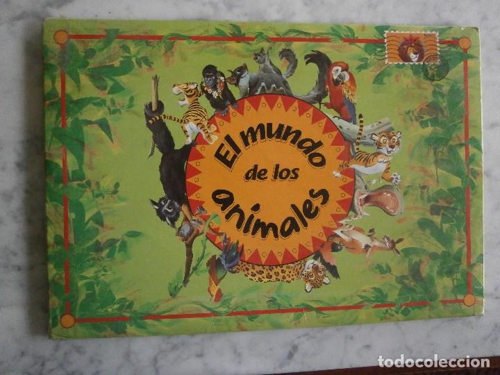 Libros: carpeta - el mundo de los animales - tormont - 1992 canada mide 48 x 33,50 c.m.