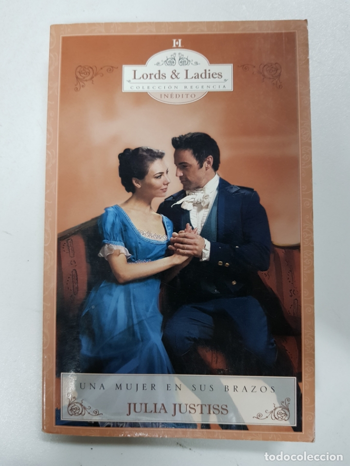 Libros: Una mujer en sus brazos / JULIA JUSTISS - Foto 1