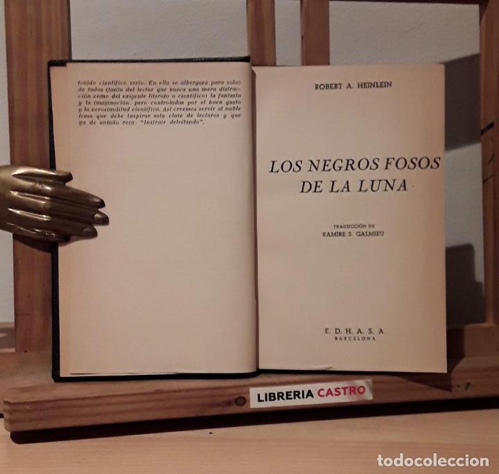 Libros: Los negros fosos de la Luna - Robert A. Heinlein - Foto 2