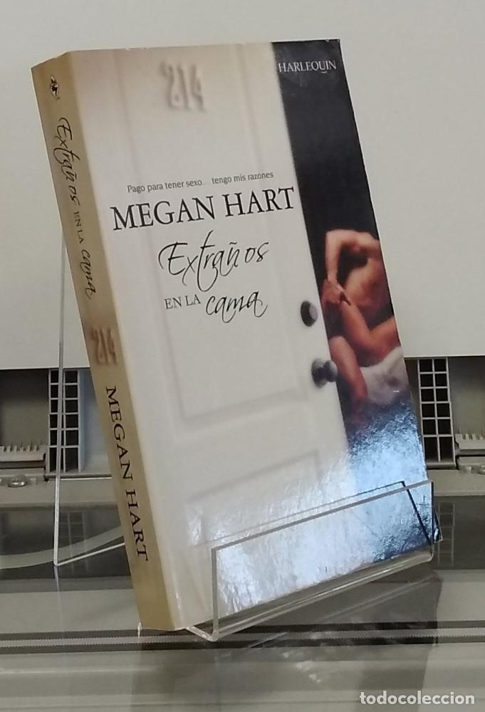 Libros: Extra&ntilde;os en un tren - Megan Hart - Foto 1