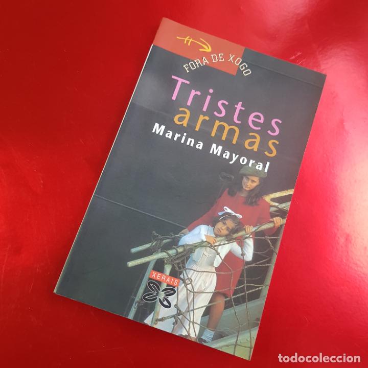 Livros em segunda m&atilde;o: LIBRO- TRISTES ARMAS-MARINA MAYORAL-XERAIS-FORA DE XOGO-23&ordf;EDICI&Oacute;N-2011GALLEGO-BUEN ESTADO-VER FOTOS