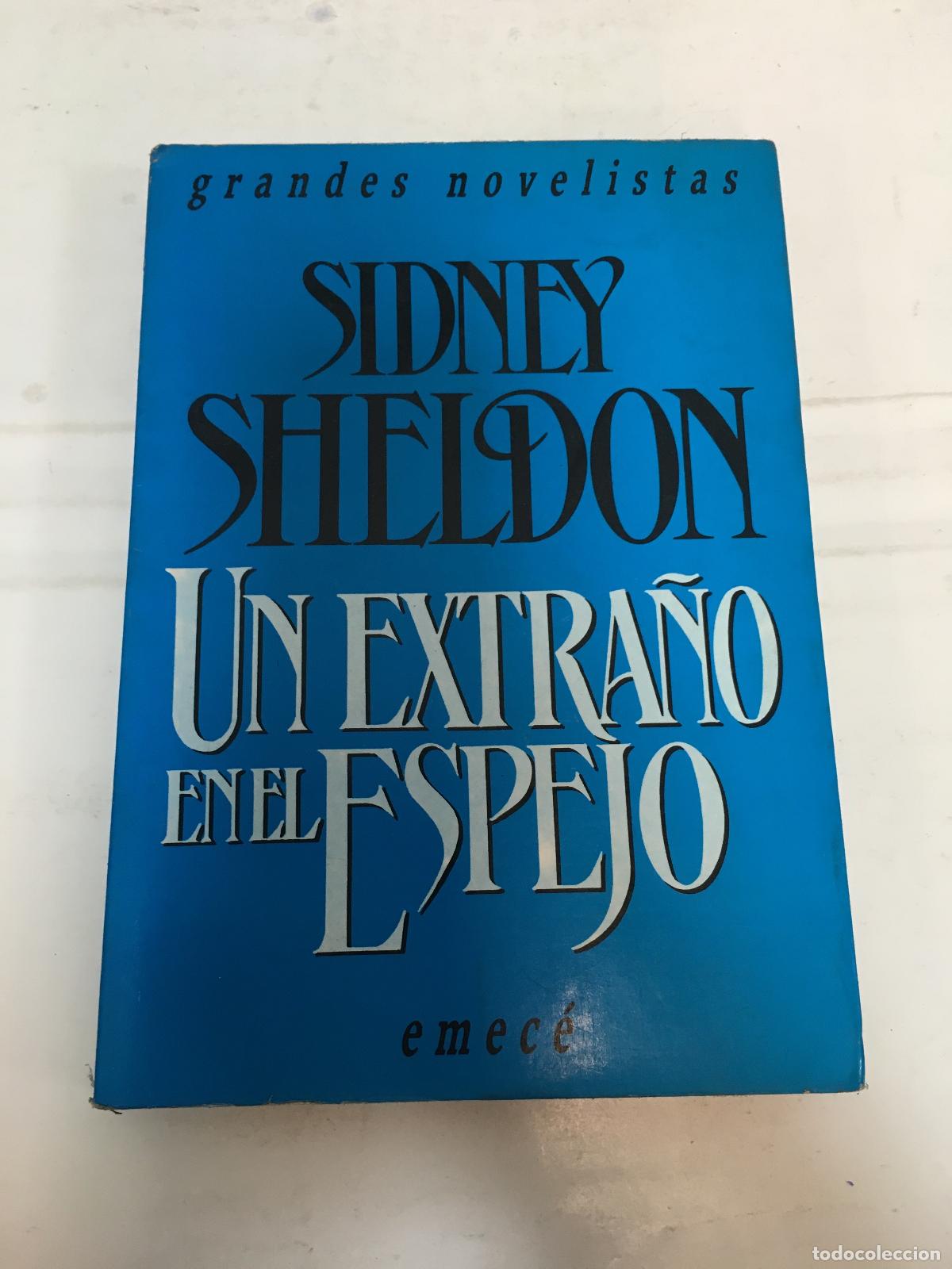Libros: Un extra&ntilde;o en el espejo - Sidney Sheldon - Foto 1