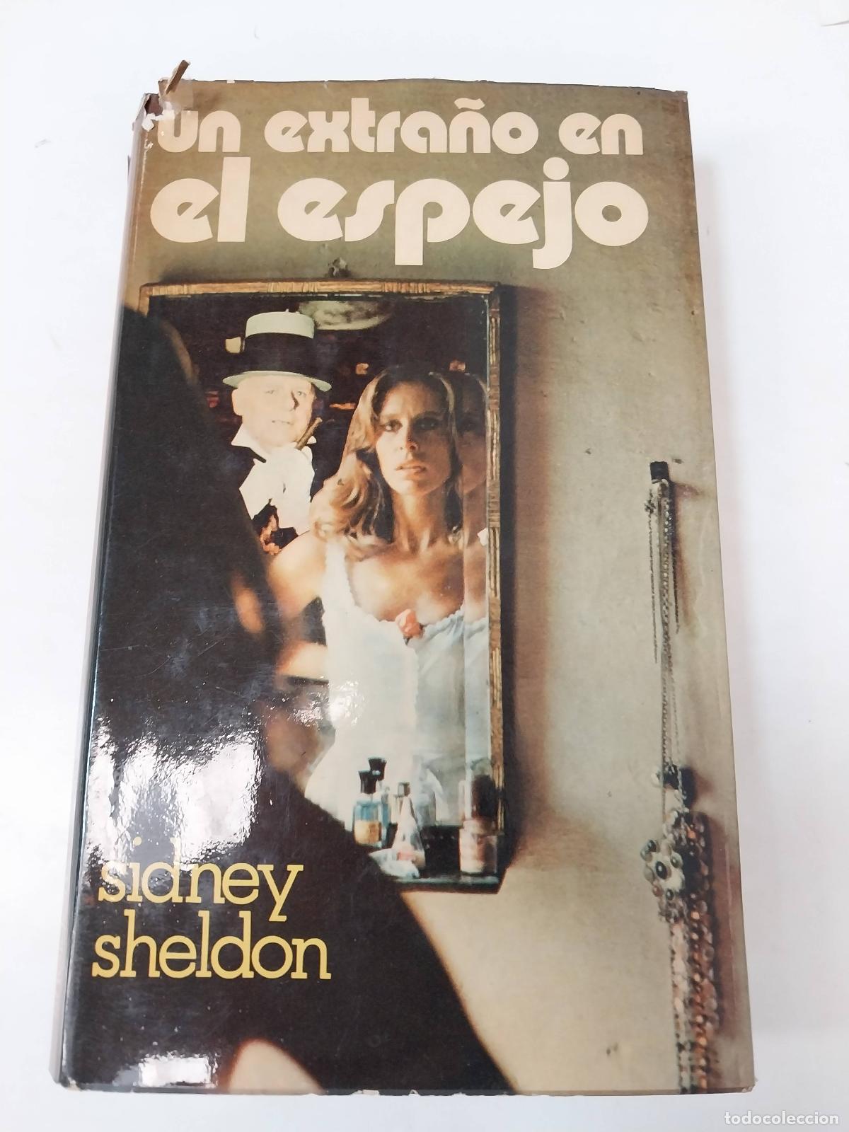 Libros: Un Extra&ntilde;o En El Espejo - Sidney Sheldon - Foto 1