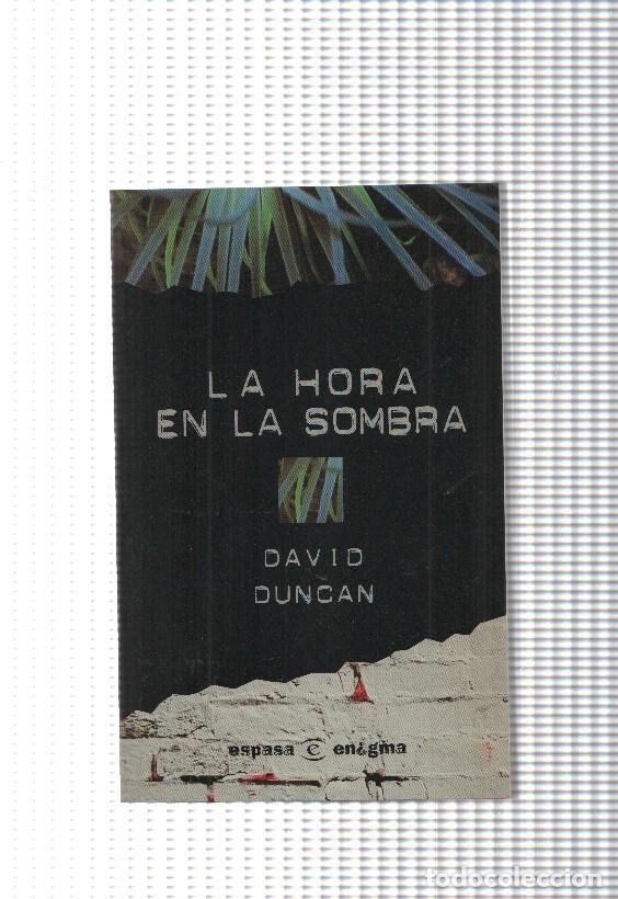 Livros em segunda m&atilde;o: coleccion enigma: La hora en la sombra - David Duncan