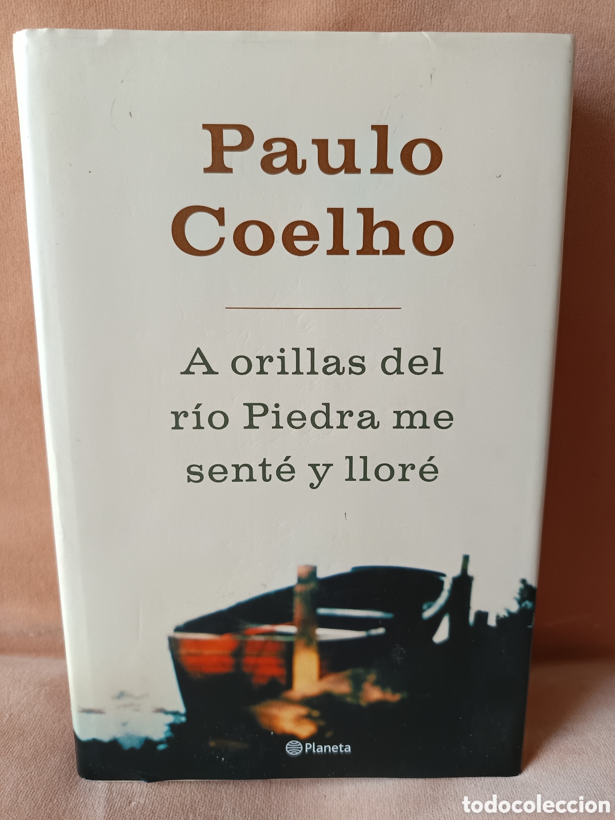 Libros: A orillas del r&iacute;o Piedra me sent&eacute; y llor&eacute; - Coelho, Paulo