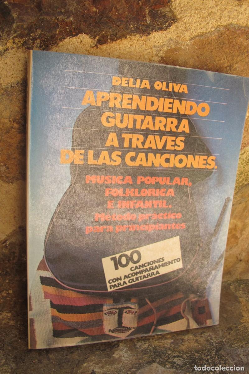 Libros: APRENDIENDO GUITARRA A TRAVES DE LAS CANCIONES. DELIA OLIVA. MUSICA POPULAR FOLKLORICA E INFANTIL.