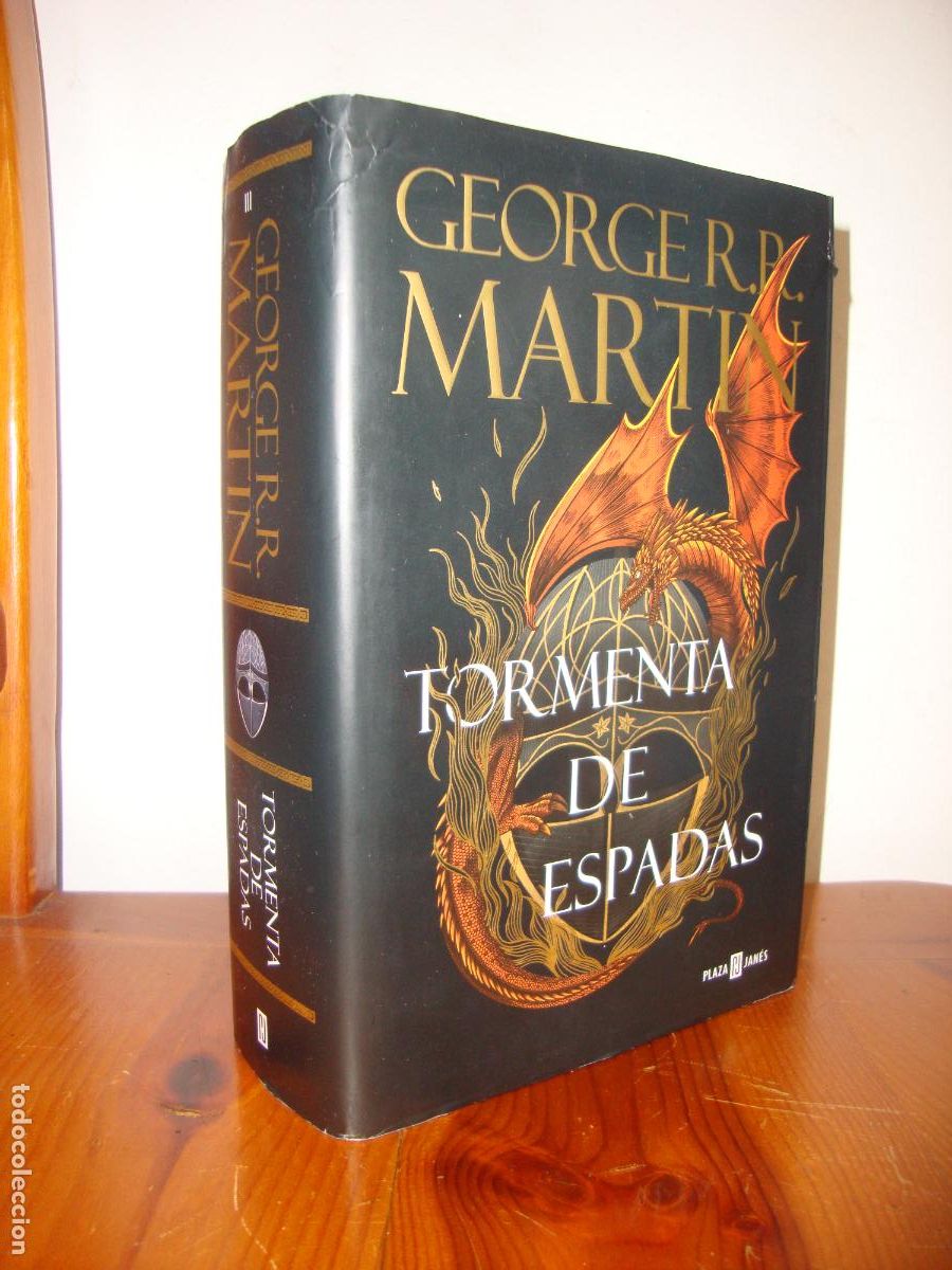 Livros em segunda m&atilde;o: TORMENTA DE ESPADAS. CANCION DE HIELO Y FUEGO III (PLAZA & JANES) - GEORGE R. R. MARTIN