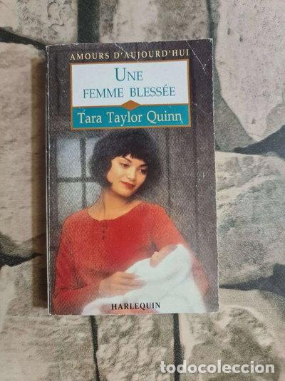 Livres: Une femme bless&eacute;e- 9782280075602