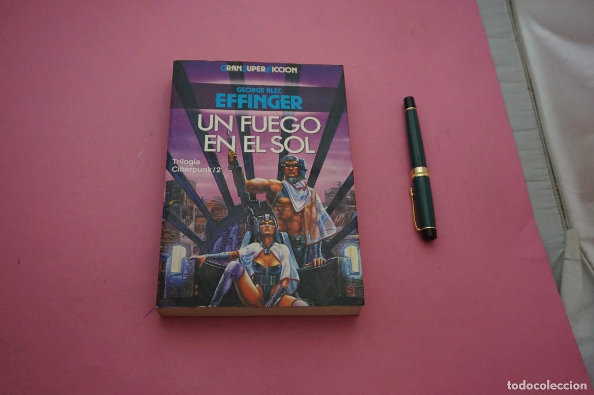 B&uuml;cher: AMF-34G/ UN FUEGO EN EL SOL - GEORGE ALEC EFFINGER / EDICIONES MARTINEZ ROCA