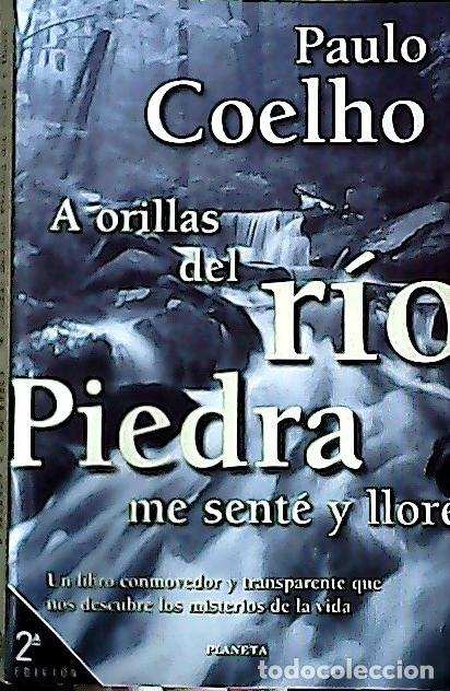 Livros em segunda m&atilde;o: A orillas del r&iacute;o Piedra me sent&eacute; y llor&eacute; - Coelho, Paulo: