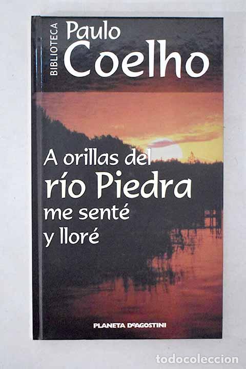 Livros em segunda m&atilde;o: A orillas del r&iacute;o Piedra me sent&eacute; y llor&eacute;.- Coelho, Paulo