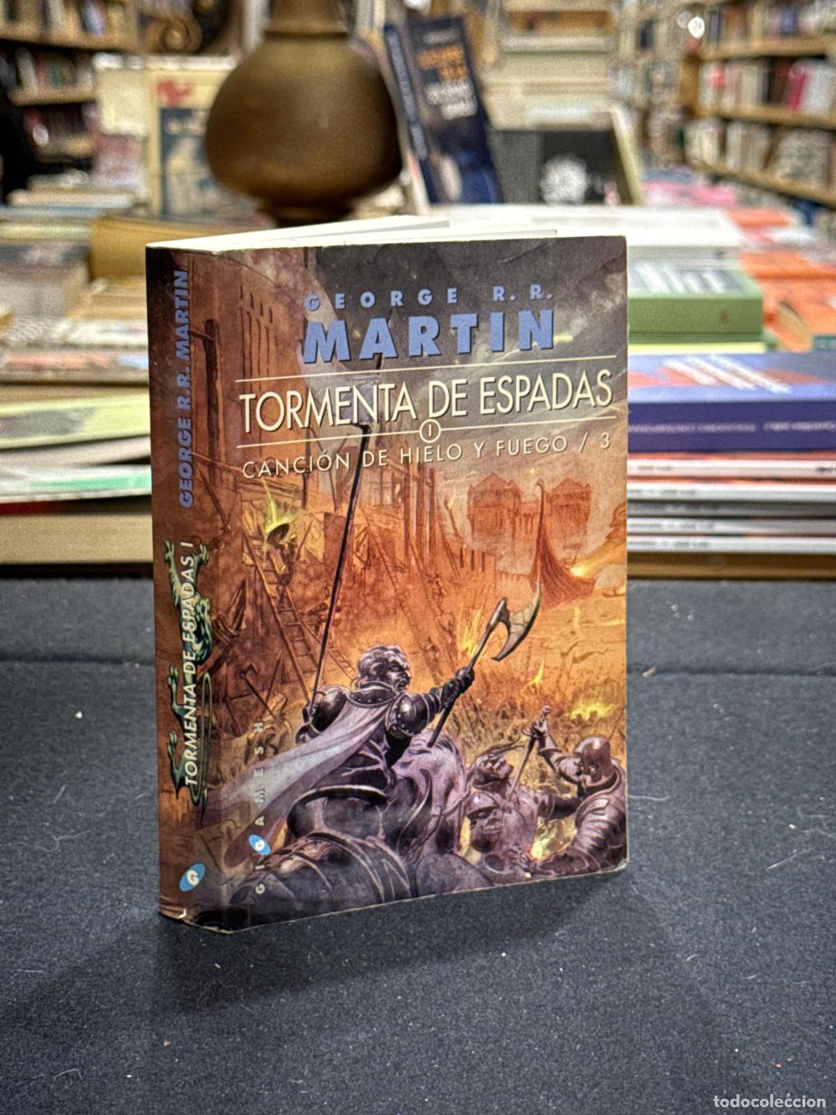 Livros em segunda m&atilde;o: Tormenta de espadas 1 - George R.R. Martin