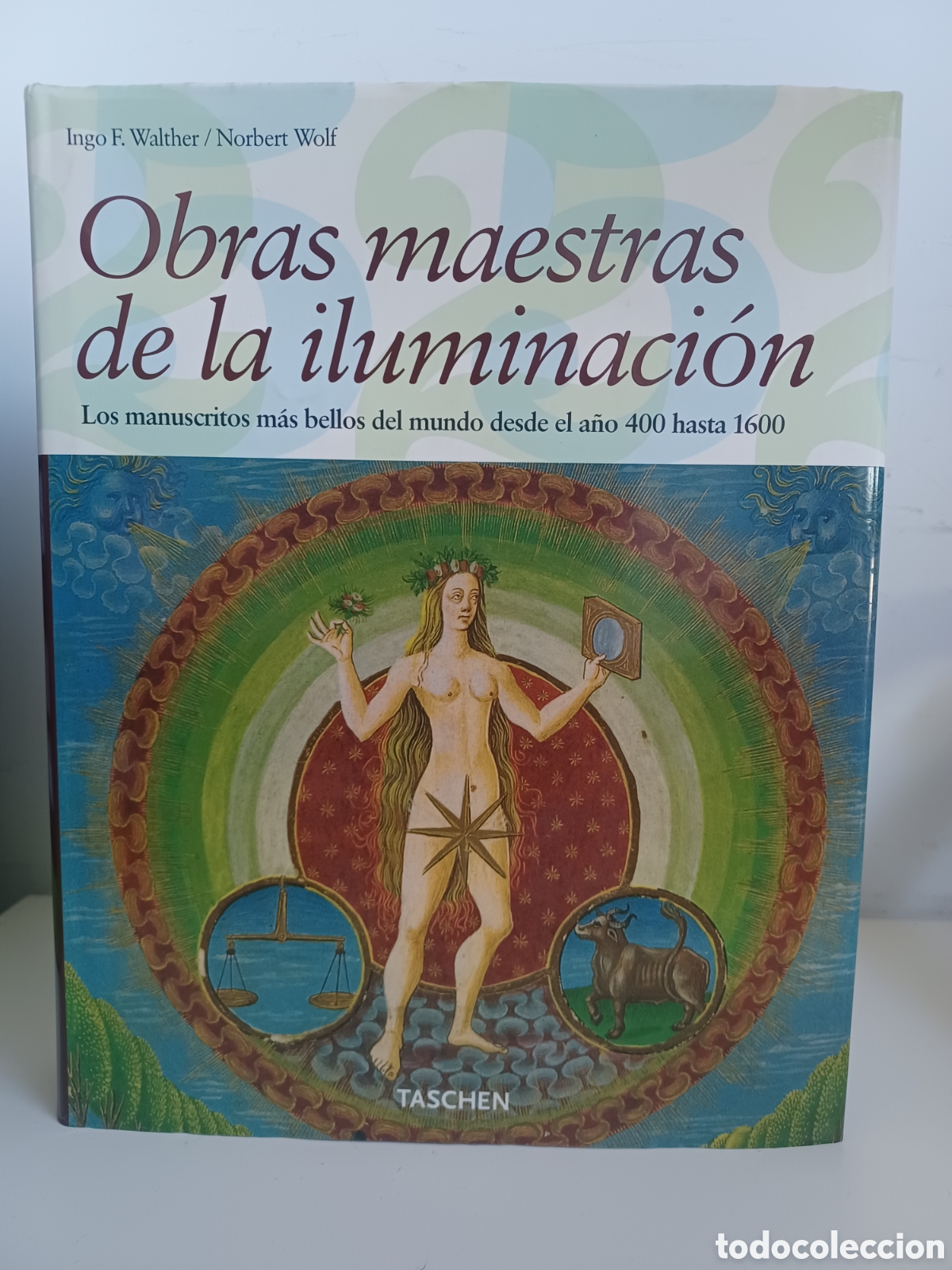Livros em segunda m&atilde;o: Obras maestras de la iluminaci&oacute;n. Los m&aacute;s bellos manuscritos/ Ingo Walther & N. Wolf/ Taschen, 2005