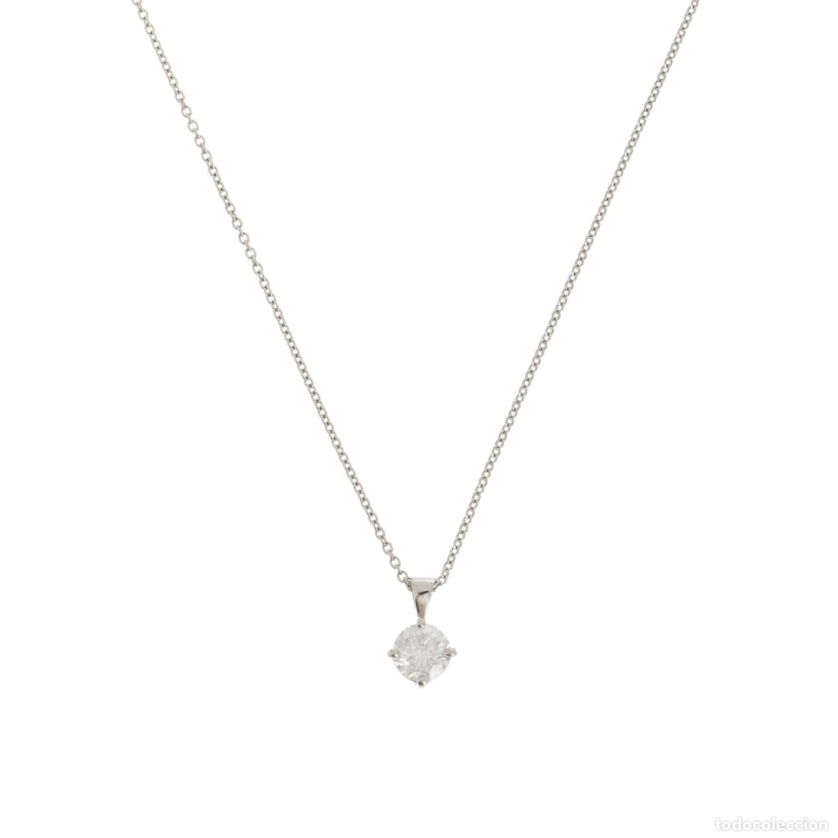 Livres: Joyas: Cadena de platino con un diamante de 1,96 quilates.