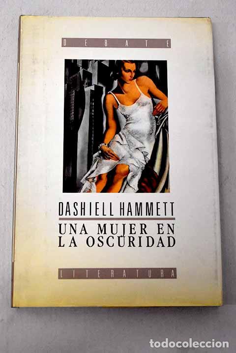 Livros em segunda m&atilde;o: Una mujer en la oscuridad: novela de un idilio peligroso.- Hammett, Dashiell