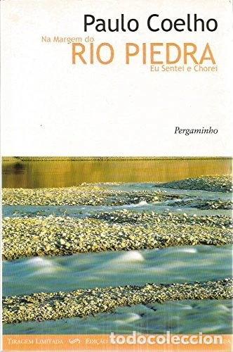 books: Na Margem do Rio Piedra Eu Sentei e Chorei- 9789727111497