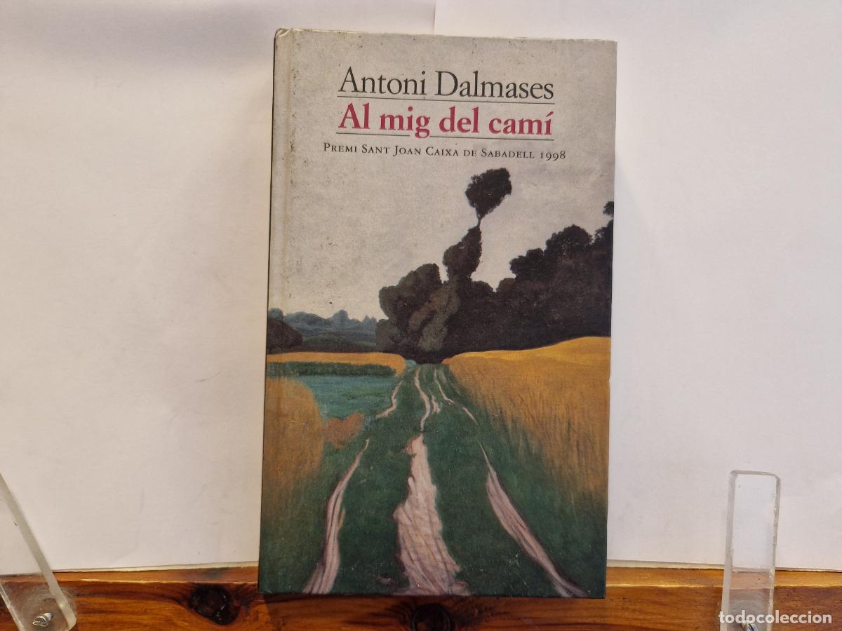 Libros: ANTONI DALMASES. AL MIG DEL CAMI. PREMI SANT JOAN CAIXA DE SABADELL 1998.